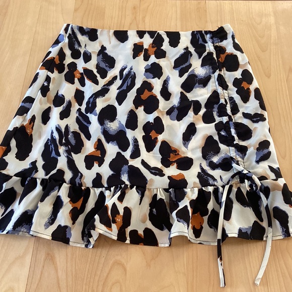 Cheeta print skirt, worn once. Blue, black, brown, and cream. Good condition. - Picture 10 of 10